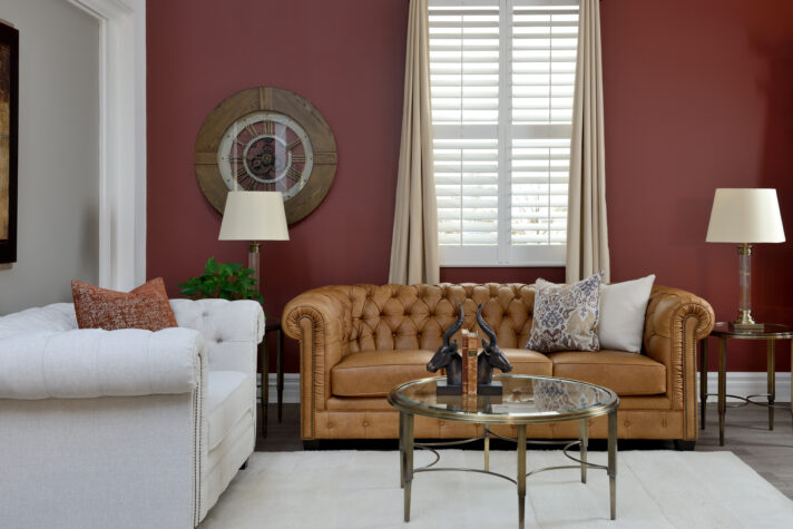 Light brown leather Chesterfield sofa from Decor-Rest styled in a living room