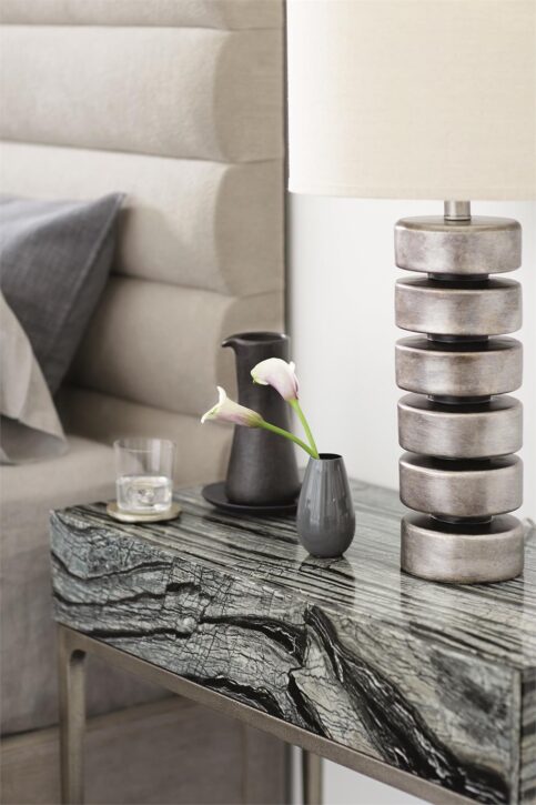 A detail shot of the Linea Black forest marble night stand by Bernhardt.