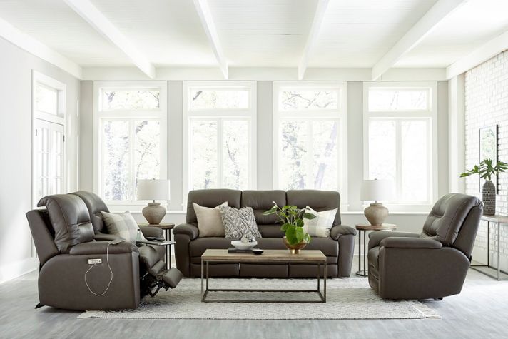 Kieran leather reclining sofa by Palliser styled in bright living room