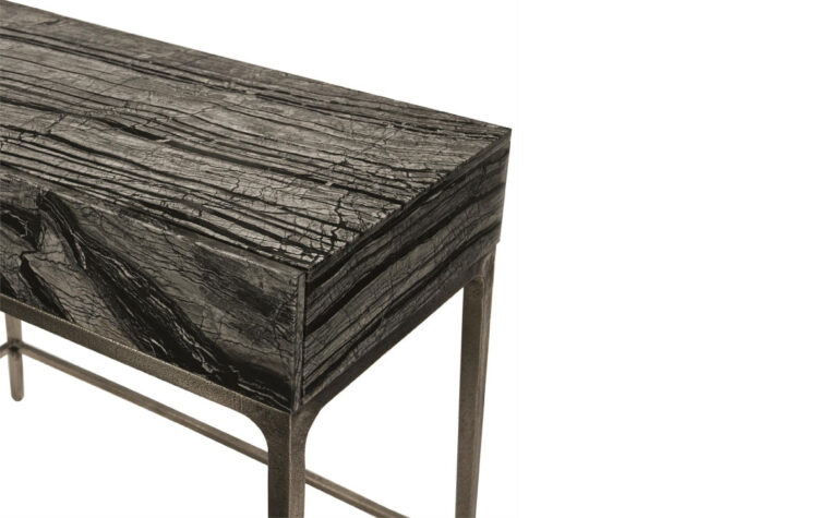 A Black forest marble night stand from Bernhardt with cast aluminum legs.