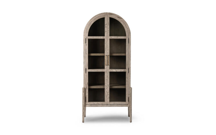A rustic solid oak arched bookcase with matching rustic oak interiors by Four Hands.