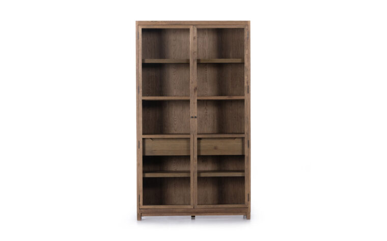 Front view of the Millie Oak Cabinet by Four Hands in the solid oak option with tempered glass doors.