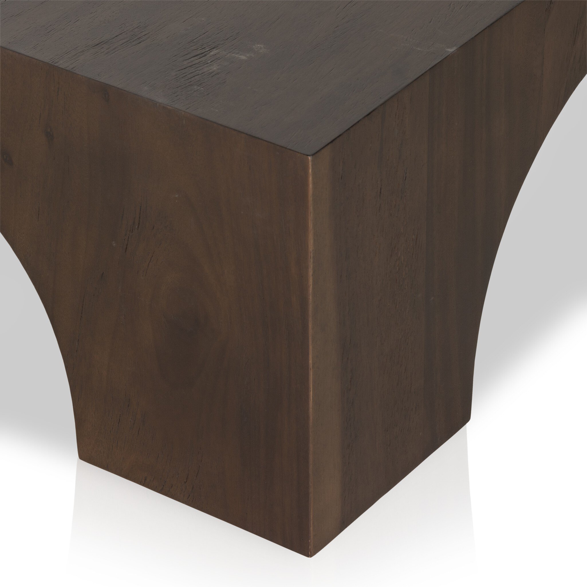 A detail shot of The Fausto dark wood coffee table by Four Hands, also available in Bleached wood.