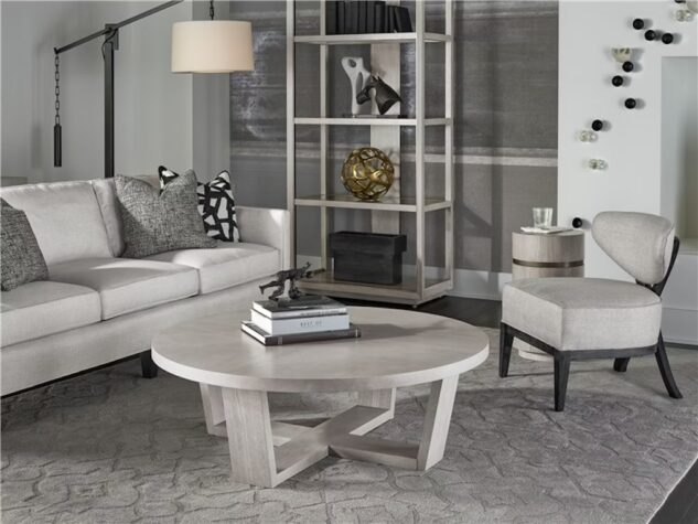 Modern Round Cocktail Table by Universal Furniture styled in living space.