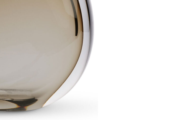 Close up detail of Oriole glass table lamp base by Flow Decor.