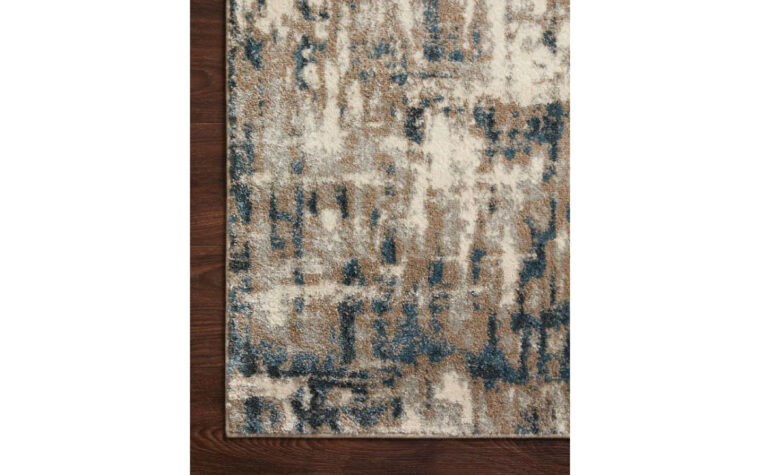Close up corner detail of the SPI-02 Stone/Blue area rug by Loloi Rugs.