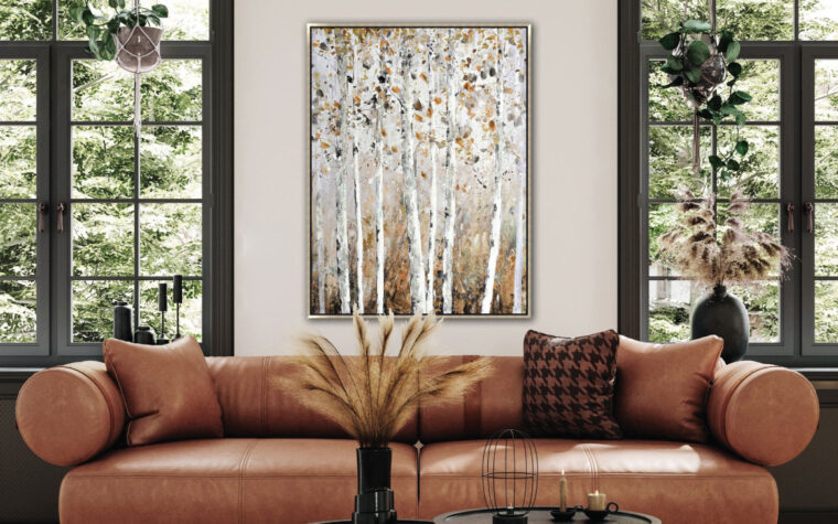 Birch Whispers wall art by Streamline Art Canada hung on white wall between two windows.
