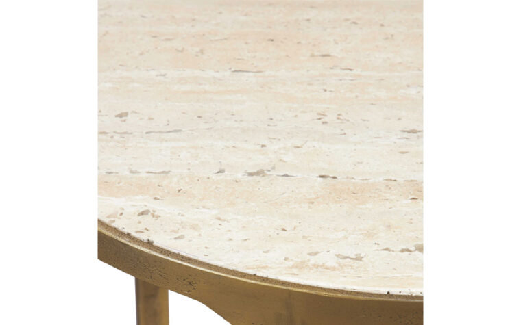 Close up of the travertine top on the Clench side table by Uttermost.
