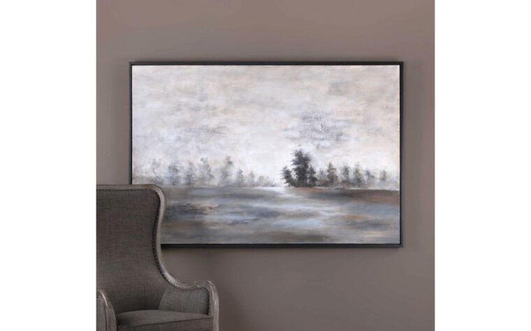 The Evening Mist Hand-Painted Canvas by Uttermost hung on a grey wall.