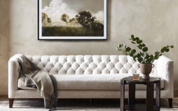 White leather tufted sofa by Four Hands