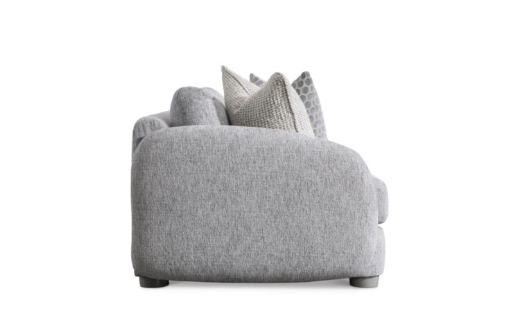 Side view of the Indy fabric curved sofa from Bernhardt