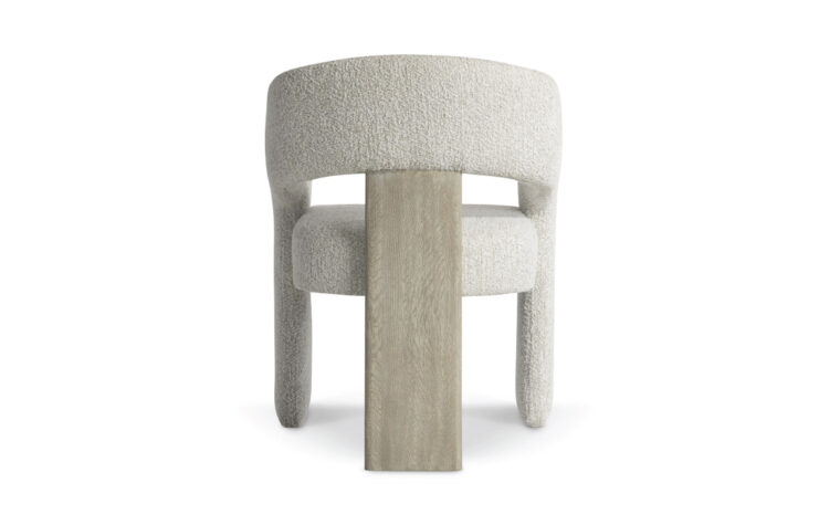 Back of the arcadia arm chair with exposed wooden post for support