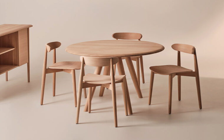 the bertanie custom white oak urban dining table in a room setting the round version