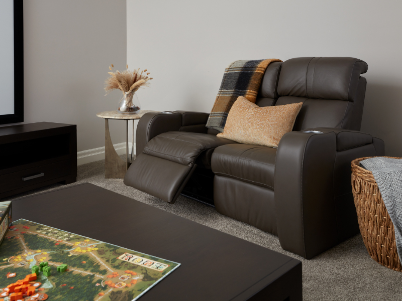 Custom theatre seating in theatre room provided by Chervin design services in Waterloo, Ontario.