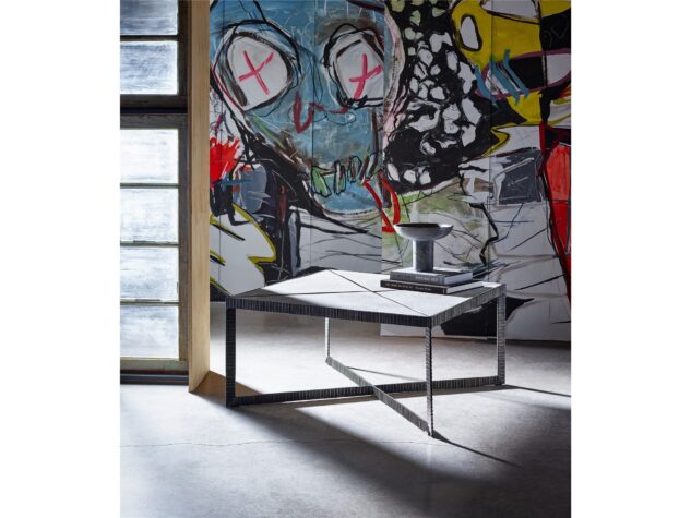 Abstraction Cocktail Table from Universal with marble stone top in artistic space