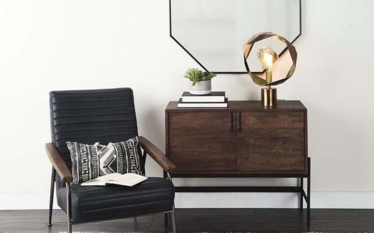an industrial style table lamp with open bulb and black finish