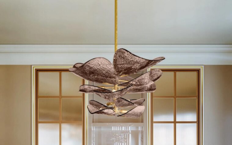a room scene of a glass chandelier with slightly smoked rose coloured glass