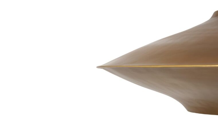 a beautiful gold pendant detail shot