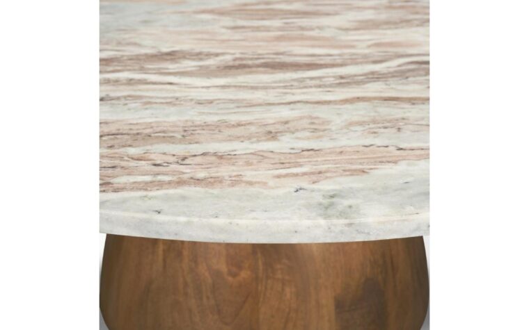 details of a marble coffee table that has pink hues