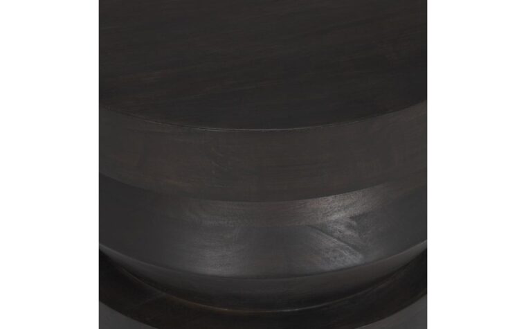 a detailed shot of an accent table with rounded fluting