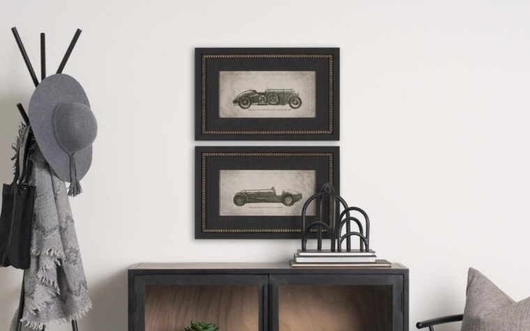 two vintage framed cars in an entry way