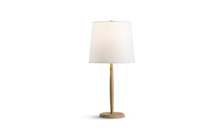 a mid century modern table lamp with a wooden base