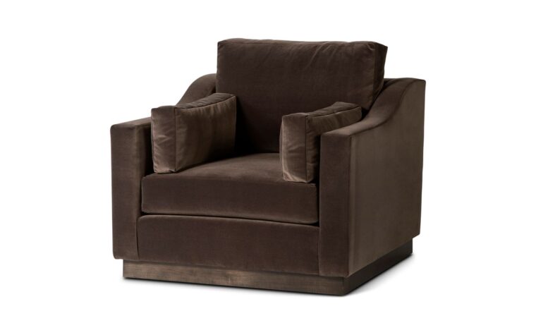 the plinith club chair in a dark brown velvet with dark brown stained base by theodore alexander